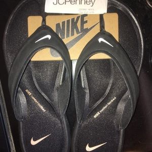 Nike foam flip flops. Never worn, NWT